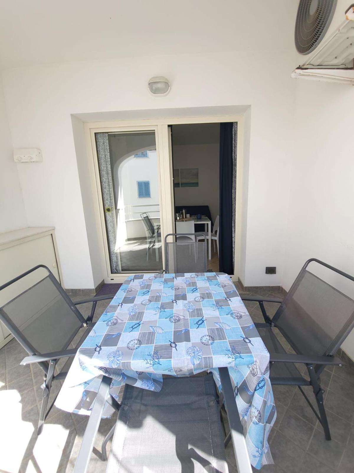 Апарт отель Le Residenze Blu Sardinia Ла-Калетта Экстерьер фото
